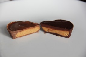 Reese's and Theo's peanut butter cups cut open